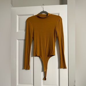 Bozzolo turtleneck bodysuit size large yellow